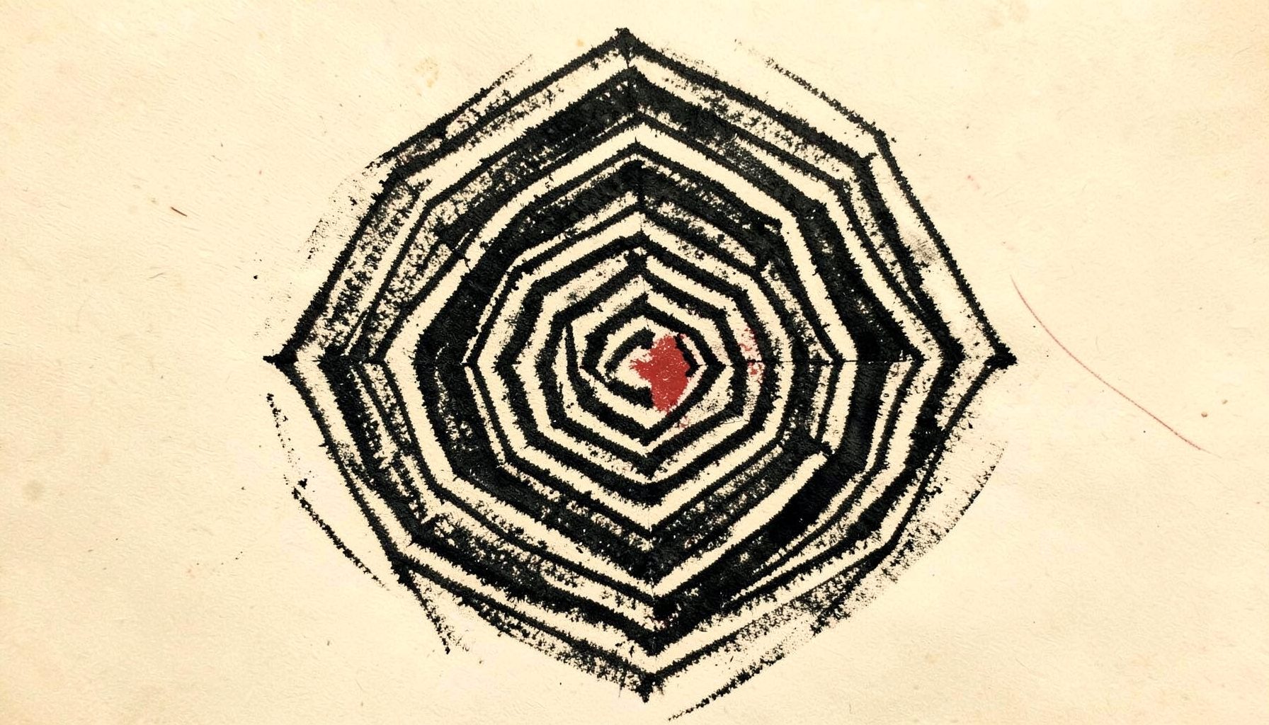 A bold charcoal-style drawing of a traditional Sak Yant geometric pattern with layered concentric lines and sacred script, rendered in deep black ink on a warm cream paper background, conveying reverence and ancient craft.